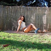 Teen shemale Cleapatra gets naked in her yard
